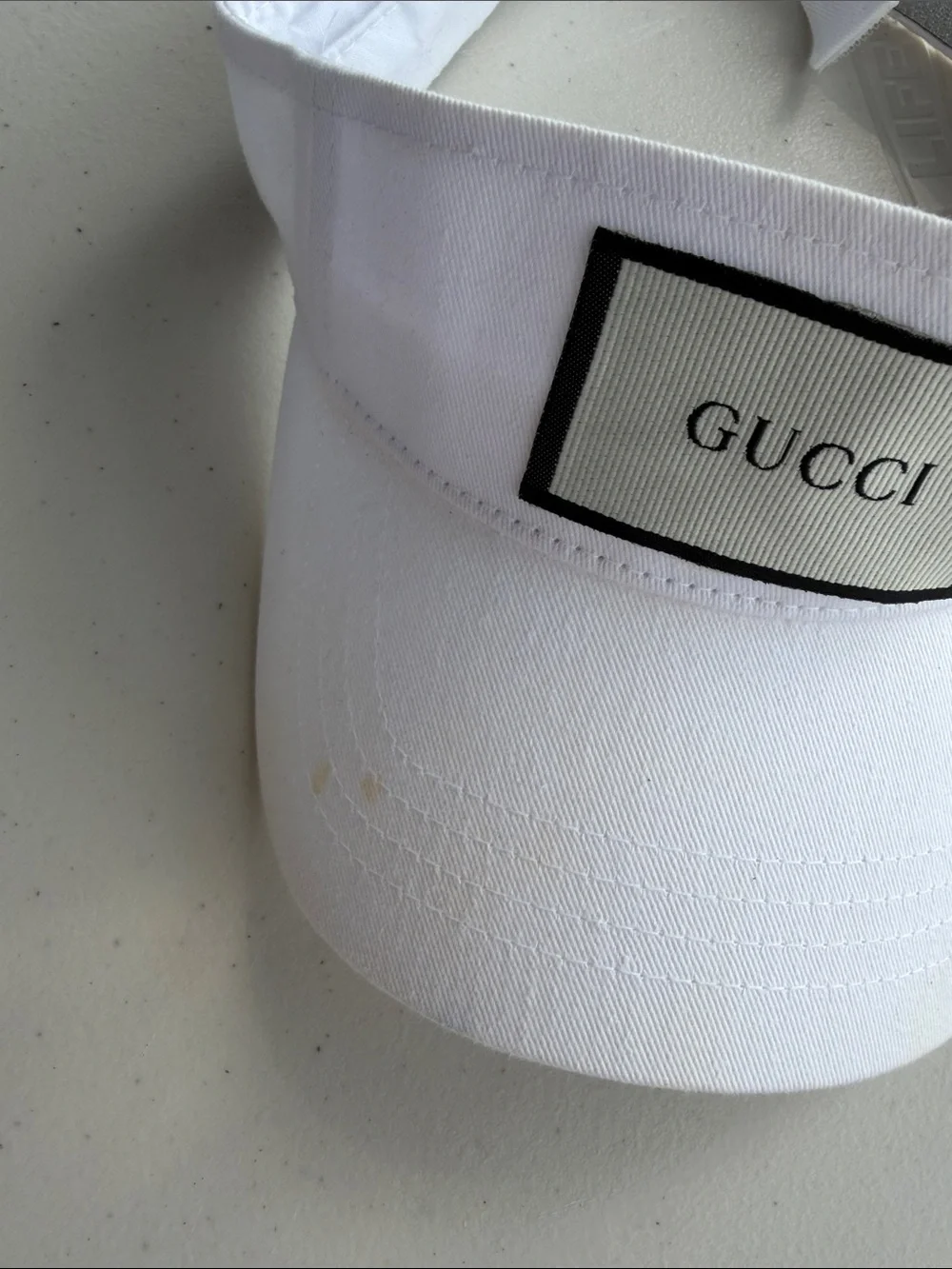 White Visor with Black-Trim Logo Patch